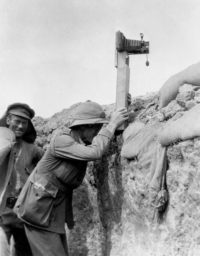 Soldier taking a photograph with a camera attached to a periscope, c 1915. Art Print - Science Museum Shop