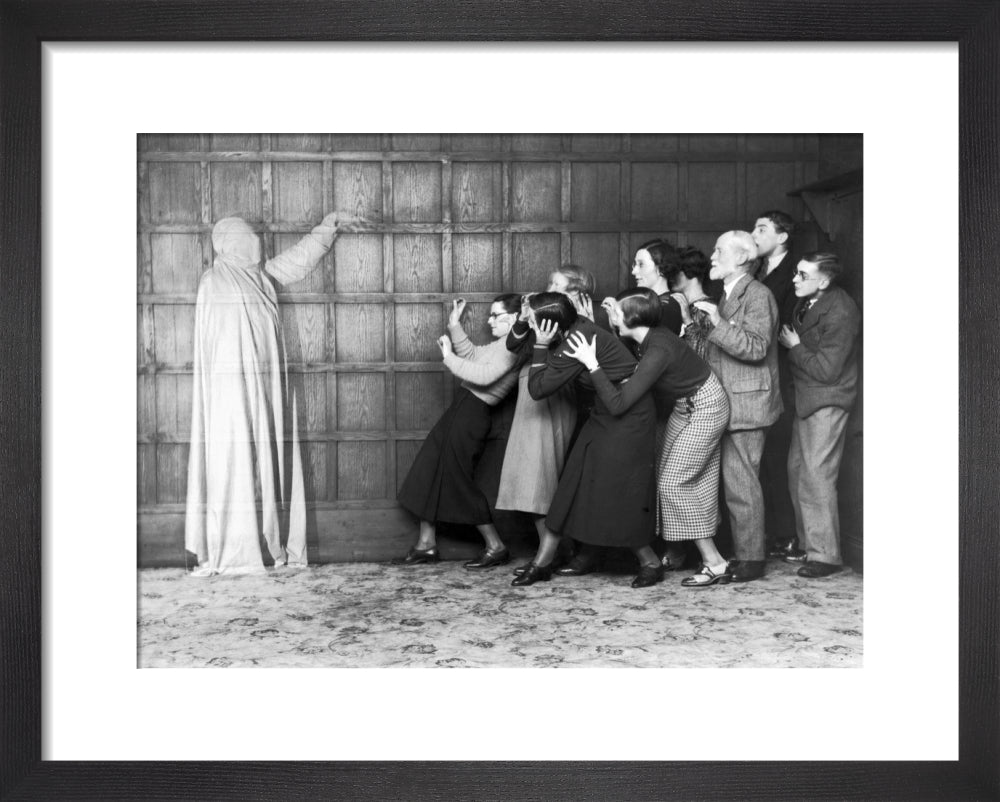 People 'cowering in fear' at the sight of a ghost, c 1920s. | Science ...