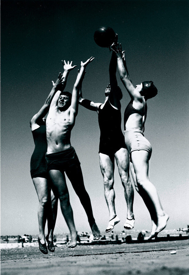 Men and women jumping for a basketball by the sea, 1930s. Art Print - Science Museum Shop