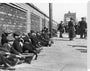 Miners resting at Central Station, Blackpool, 21 June 1919. stretched canvas large none Art Print - Science Museum Shop