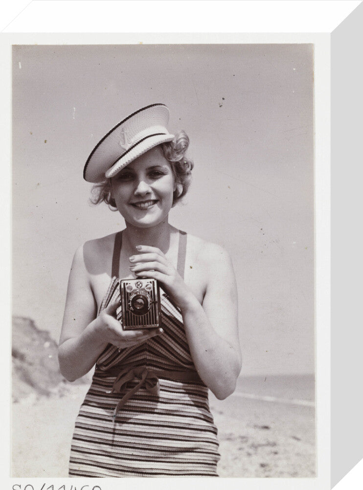 Woman taking a photograph, about 1935 stretched canvas small none Art Print - Science Museum Shop