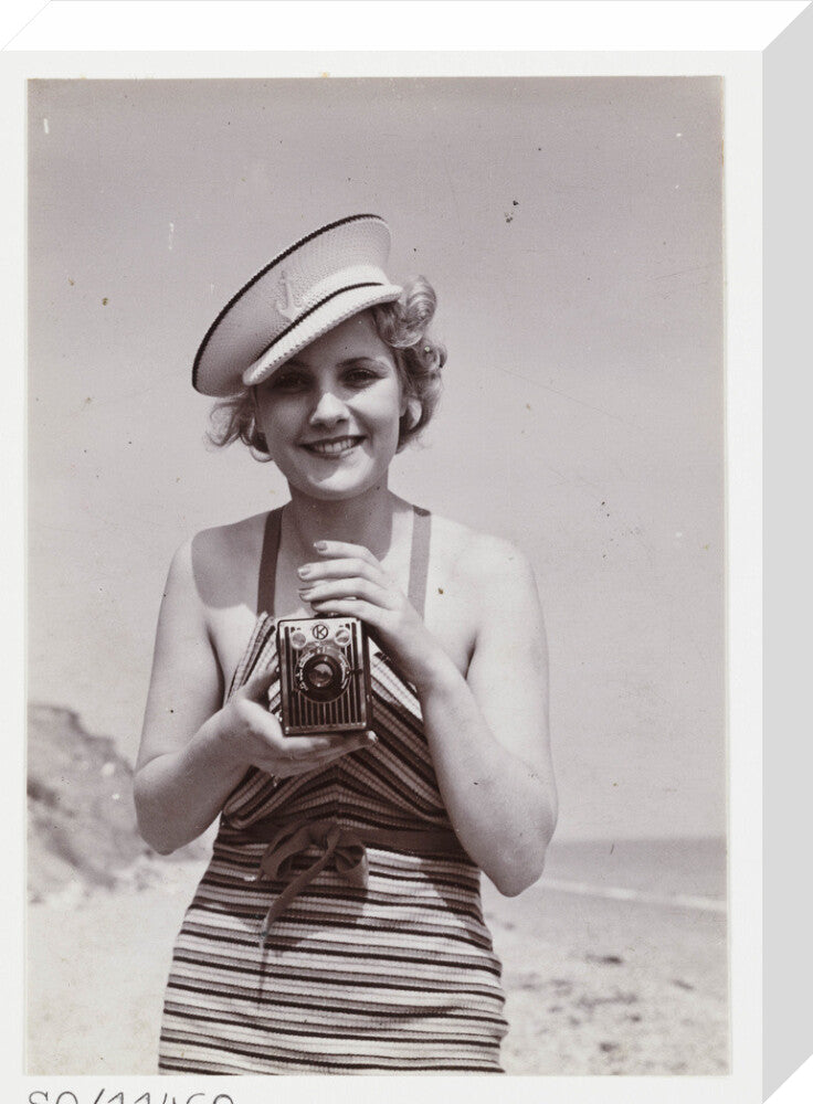 Woman taking a photograph, about 1935 stretched canvas medium none Art Print - Science Museum Shop