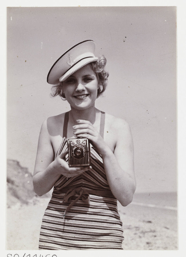 Woman taking a photograph, about 1935 Art Print - Science Museum Shop