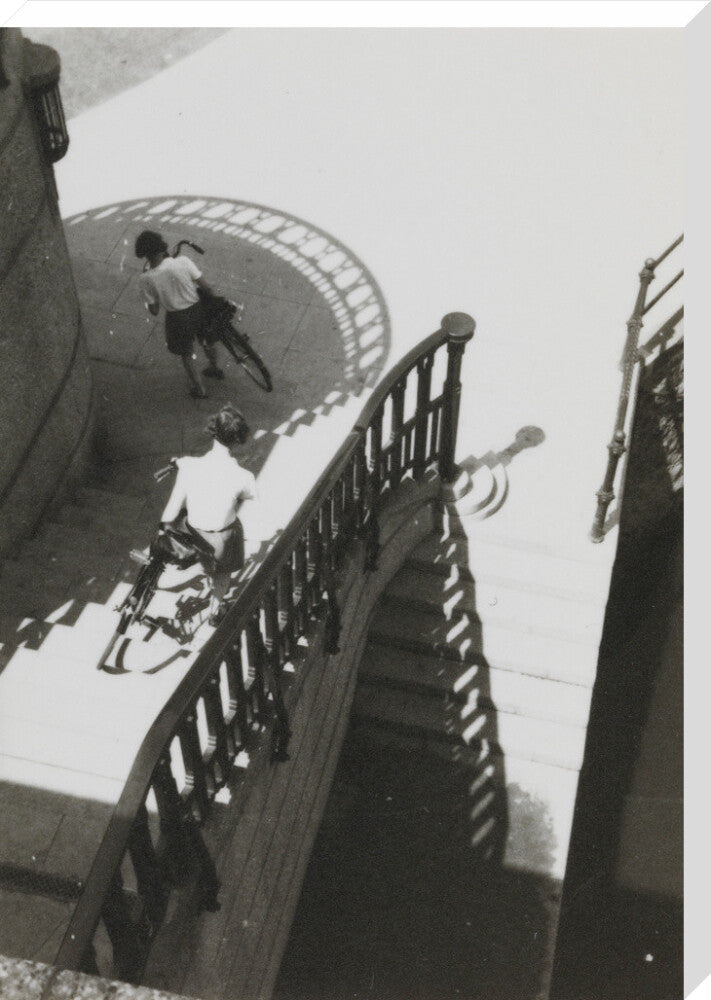 Carrying bicycles down steps stretched canvas extra large none Art Print - Science Museum Shop