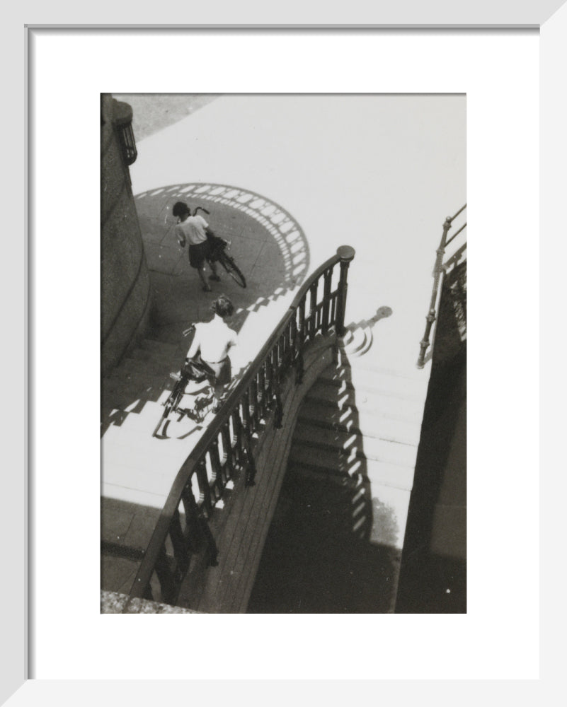 Carrying bicycles down steps art print extra small white Art Print - Science Museum Shop