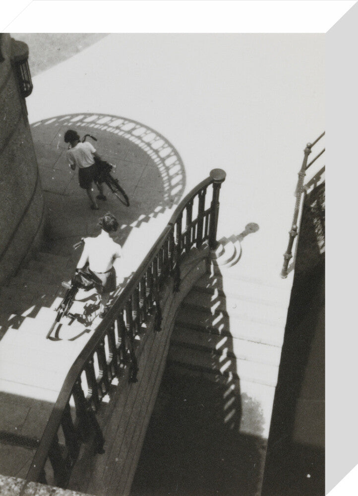 Carrying bicycles down steps stretched canvas small none Art Print - Science Museum Shop