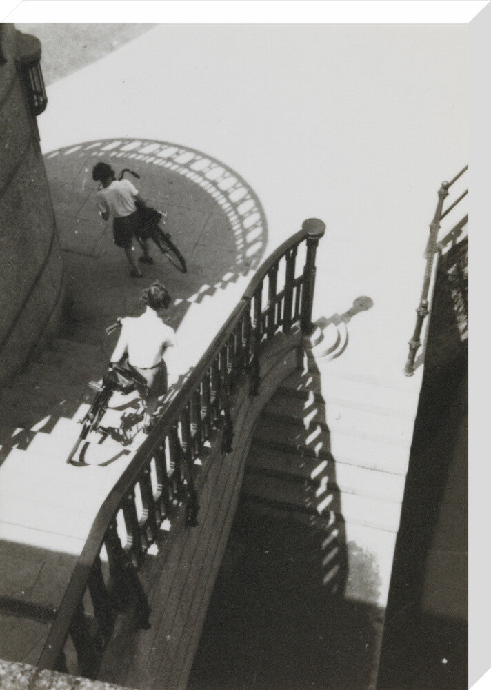 Carrying bicycles down steps stretched canvas large none Art Print - Science Museum Shop