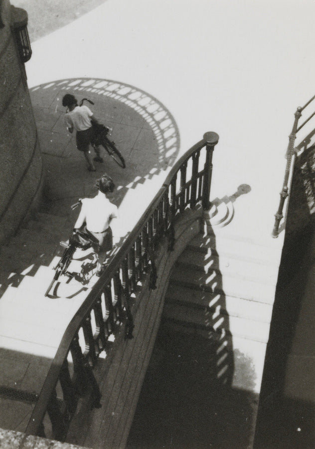Carrying bicycles down steps Art Print - Science Museum Shop