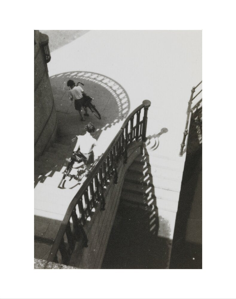 Carrying bicycles down steps art print extra small none Art Print - Science Museum Shop