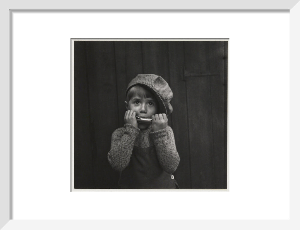 Boy playing the harmonica, about 1925 art print small white Art Print - Science Museum Shop