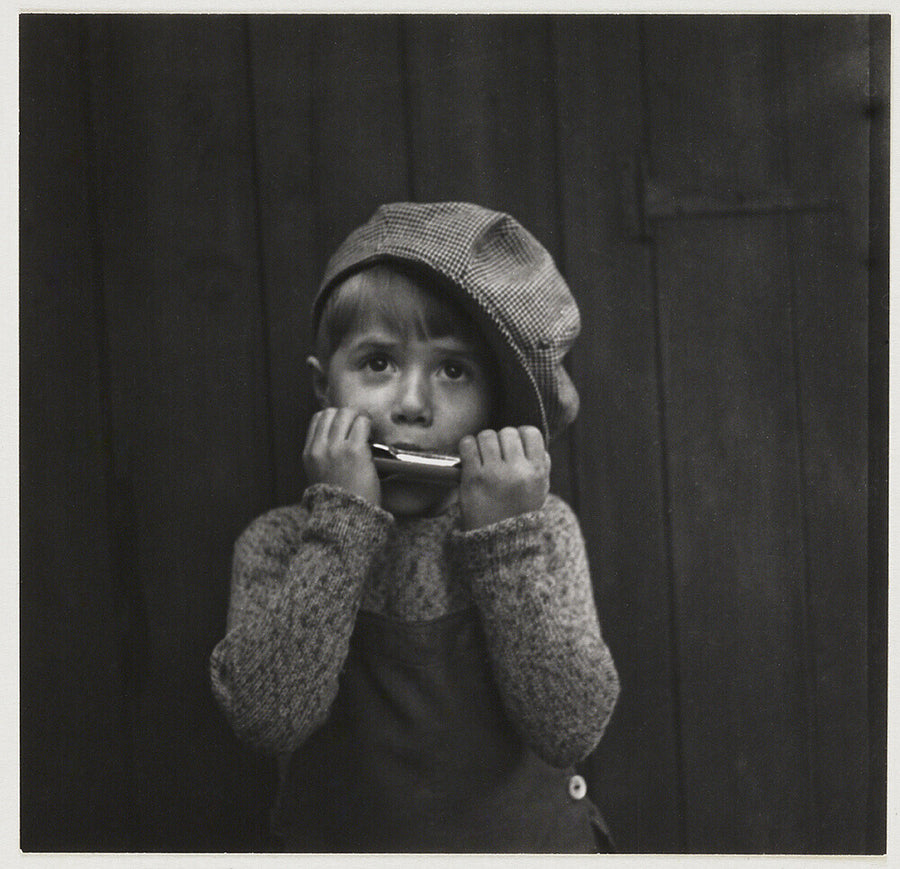 Boy playing the harmonica, about 1925 Art Print - Science Museum Shop