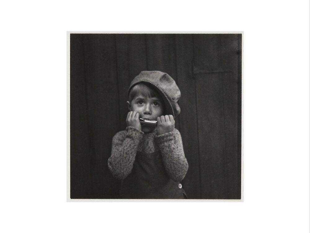 Boy playing the harmonica, about 1925 art print medium none Art Print - Science Museum Shop