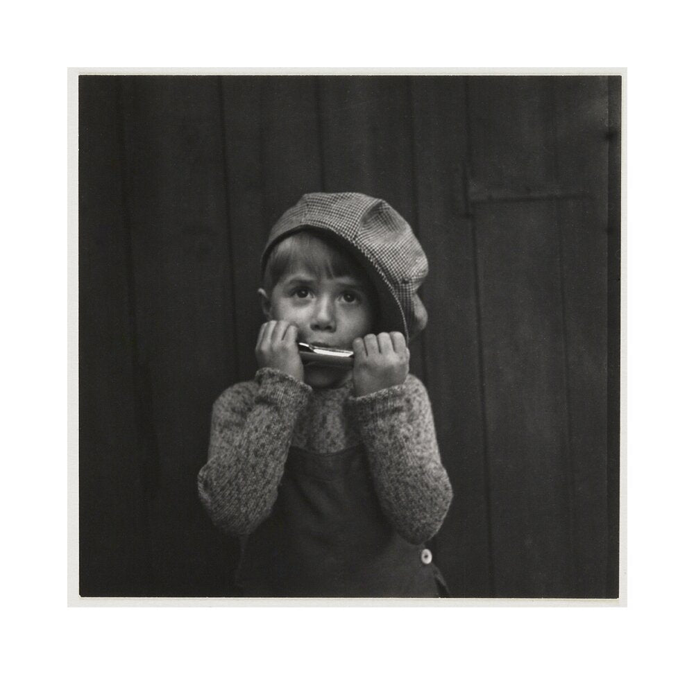 Boy playing the harmonica, about 1925 unstretched canvas medium none Art Print - Science Museum Shop