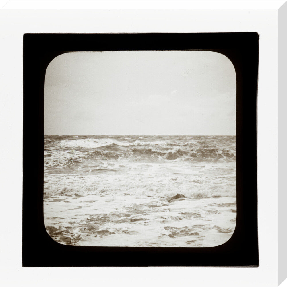 A magic lantern slide of sea waves crashing against the shore by Birt Acres, c. 1893. stretched canvas large none Art Print - Science Museum Shop