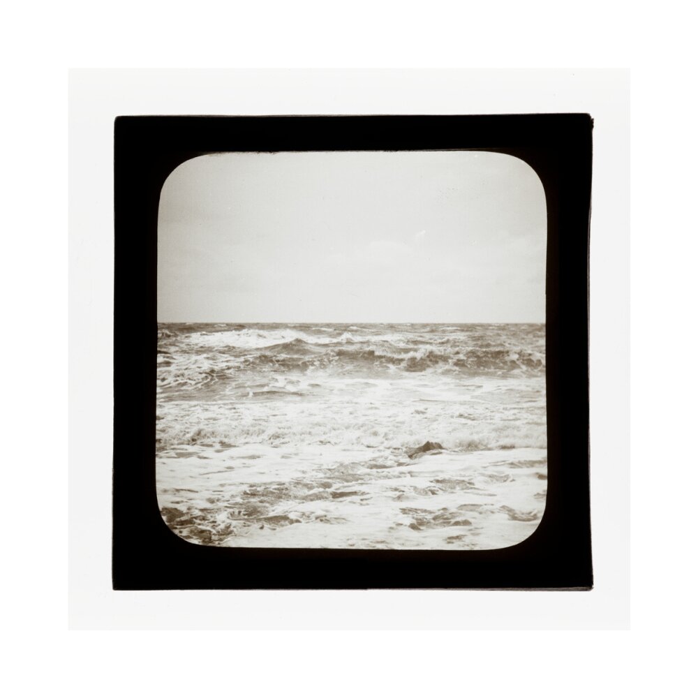 A magic lantern slide of sea waves crashing against the shore by Birt Acres, c. 1893. art print extra large none Art Print - Science Museum Shop