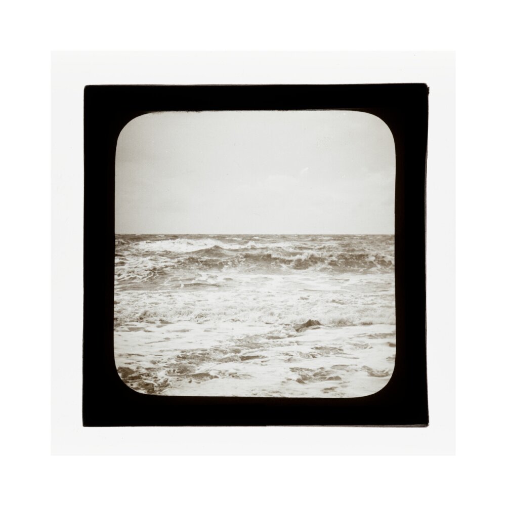 A magic lantern slide of sea waves crashing against the shore by Birt Acres, c. 1893. art print small none Art Print - Science Museum Shop