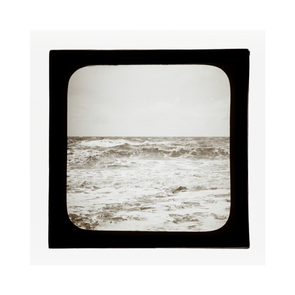 A magic lantern slide of sea waves crashing against the shore by Birt Acres, c. 1893. art print medium none Art Print - Science Museum Shop