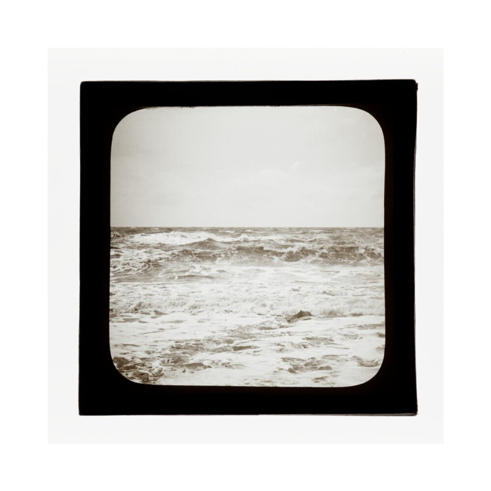 A magic lantern slide of sea waves crashing against the shore by Birt Acres, c. 1893. unstretched canvas medium none Art Print - Science Museum Shop