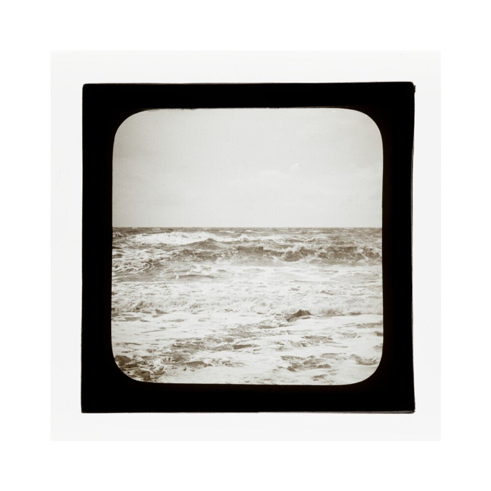A magic lantern slide of sea waves crashing against the shore by Birt Acres, c. 1893. art print large none Art Print - Science Museum Shop