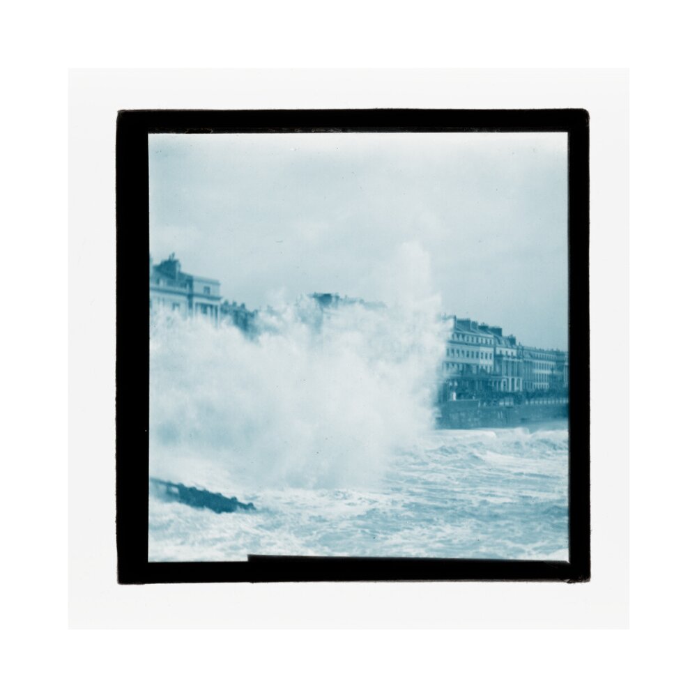 A magic lantern slide of sea waves crashing against the shore by Birt Acres, c. 1893. art print extra large none Art Print - Science Museum Shop