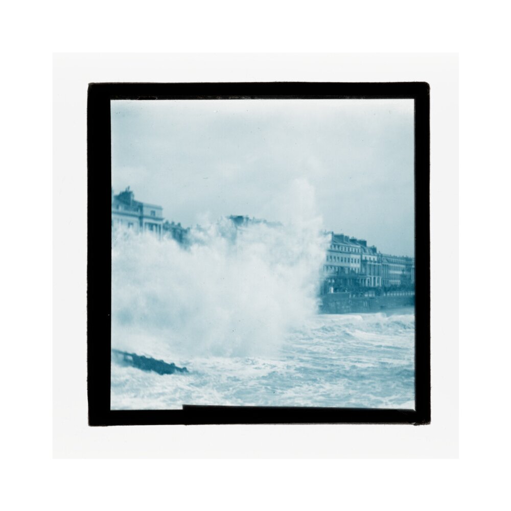 A magic lantern slide of sea waves crashing against the shore by Birt Acres, c. 1893. art print large none Art Print - Science Museum Shop