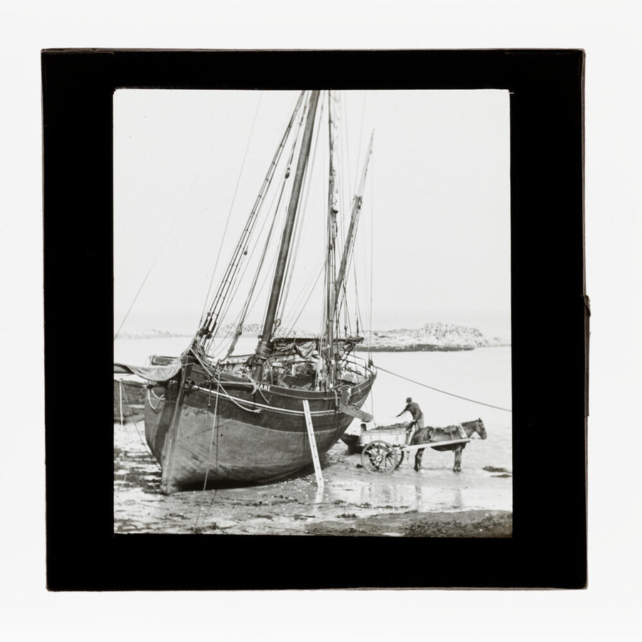 A magic lantern slide of a boat in harbour by Birt Acres, c. 1893. Art Print - Science Museum Shop