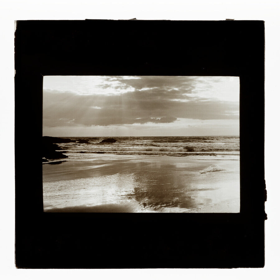 A magic lantern slide entitled Sunset, Woolacombe by Birt Acres, c. 1893. Art Print - Science Museum Shop