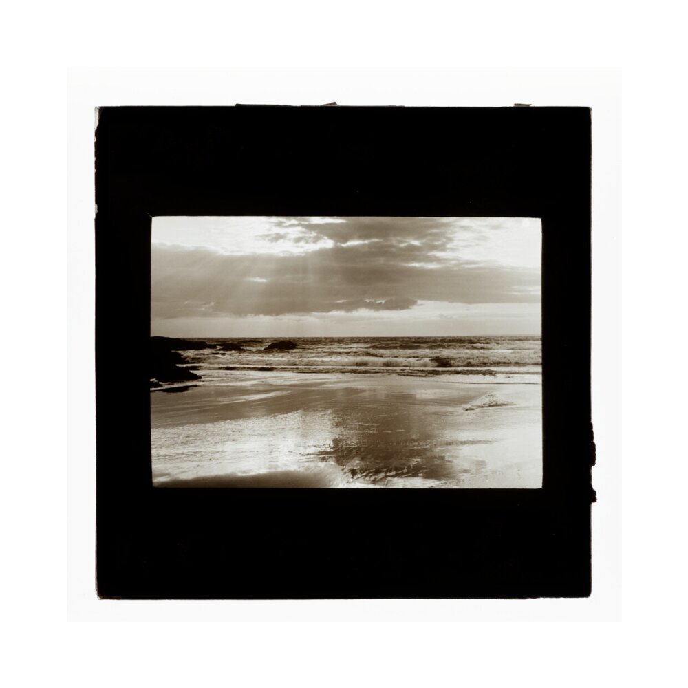 A magic lantern slide entitled Sunset, Woolacombe by Birt Acres, c. 1893. unstretched canvas medium none Art Print - Science Museum Shop