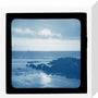 A magic lantern slide showing a seascape with rocks by Birt Acres, c. 1893. (Blue carbon for projection). stretched canvas small none Art Print - Science Museum Shop