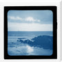 A magic lantern slide showing a seascape with rocks by Birt Acres, c. 1893. (Blue carbon for projection). stretched canvas large none Art Print - Science Museum Shop
