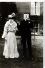 A couple, each holding up a number in front of their face circa 1905 stretched canvas extra large none Art Print - Science Museum Shop