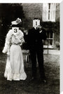 A couple, each holding up a number in front of their face circa 1905 stretched canvas large none Art Print - Science Museum Shop