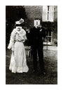 A couple, each holding up a number in front of their face circa 1905 unstretched canvas extra large none Art Print - Science Museum Shop