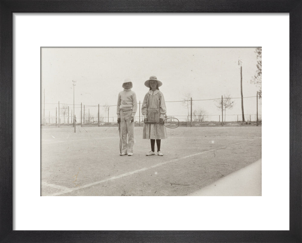 H. H. Prince Nikita Alexandrovitch and Atia Staroselsky on the tennis court, both are holding rackets. art print extra small black Art Print - Science Museum Shop