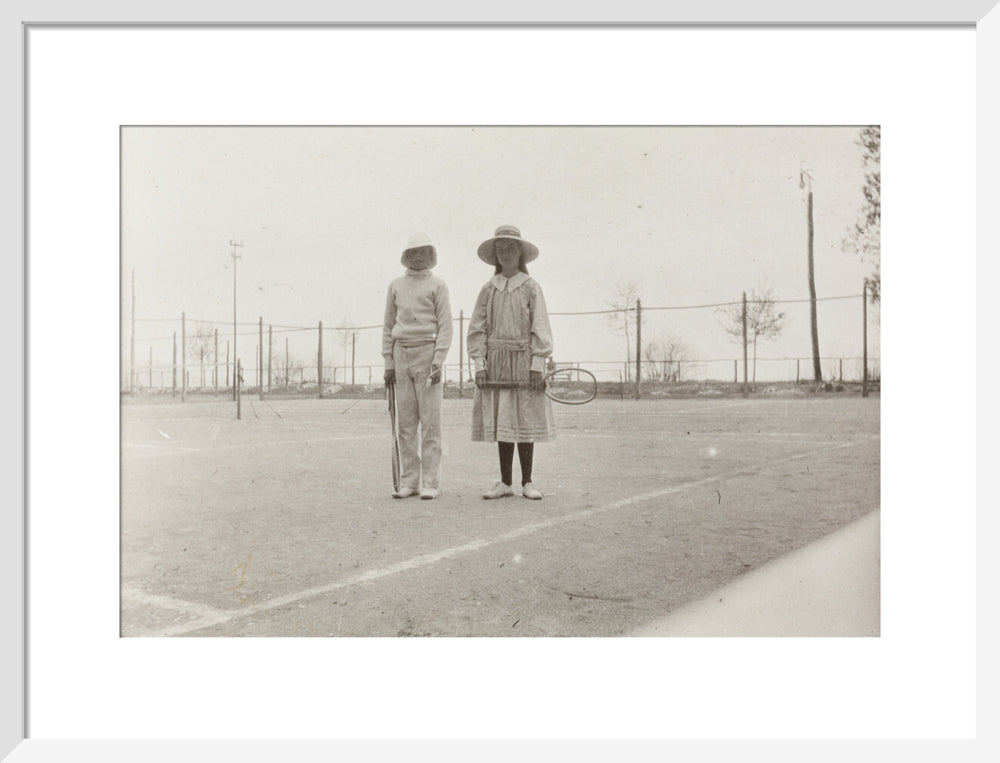H. H. Prince Nikita Alexandrovitch and Atia Staroselsky on the tennis court, both are holding rackets. art print medium white Art Print - Science Museum Shop
