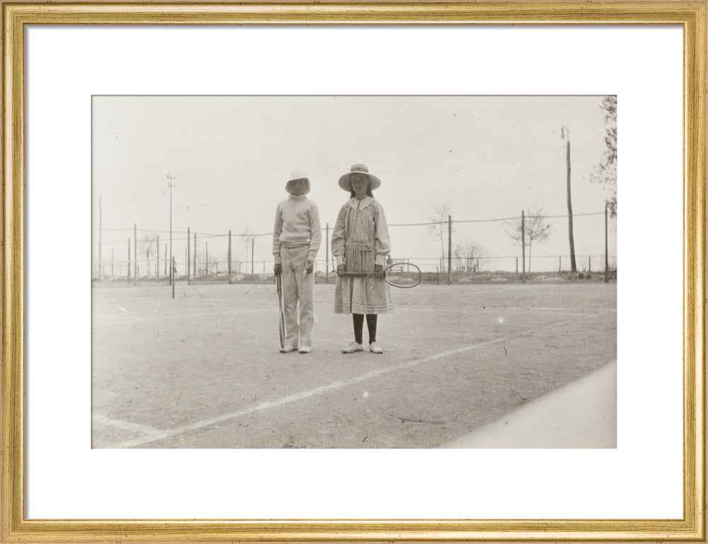 H. H. Prince Nikita Alexandrovitch and Atia Staroselsky on the tennis court, both are holding rackets. art print medium gold Art Print - Science Museum Shop