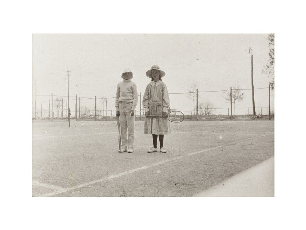 H. H. Prince Nikita Alexandrovitch and Atia Staroselsky on the tennis court, both are holding rackets. art print extra large none Art Print - Science Museum Shop
