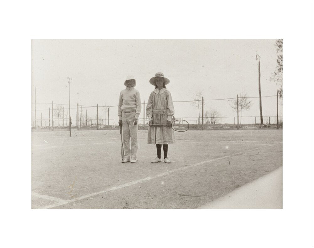 H. H. Prince Nikita Alexandrovitch and Atia Staroselsky on the tennis court, both are holding rackets. art print extra small none Art Print - Science Museum Shop