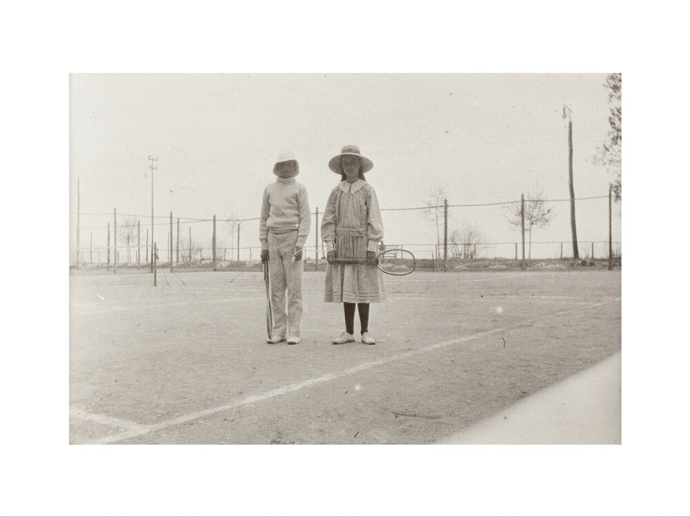 H. H. Prince Nikita Alexandrovitch and Atia Staroselsky on the tennis court, both are holding rackets. art print small none Art Print - Science Museum Shop