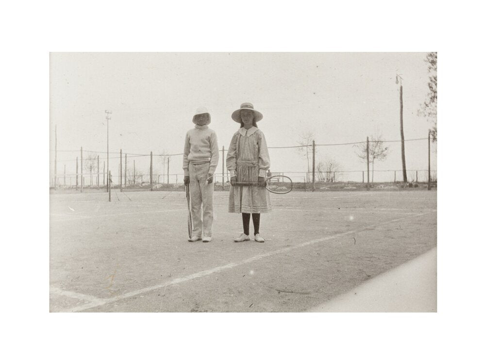 H. H. Prince Nikita Alexandrovitch and Atia Staroselsky on the tennis court, both are holding rackets. art print medium none Art Print - Science Museum Shop