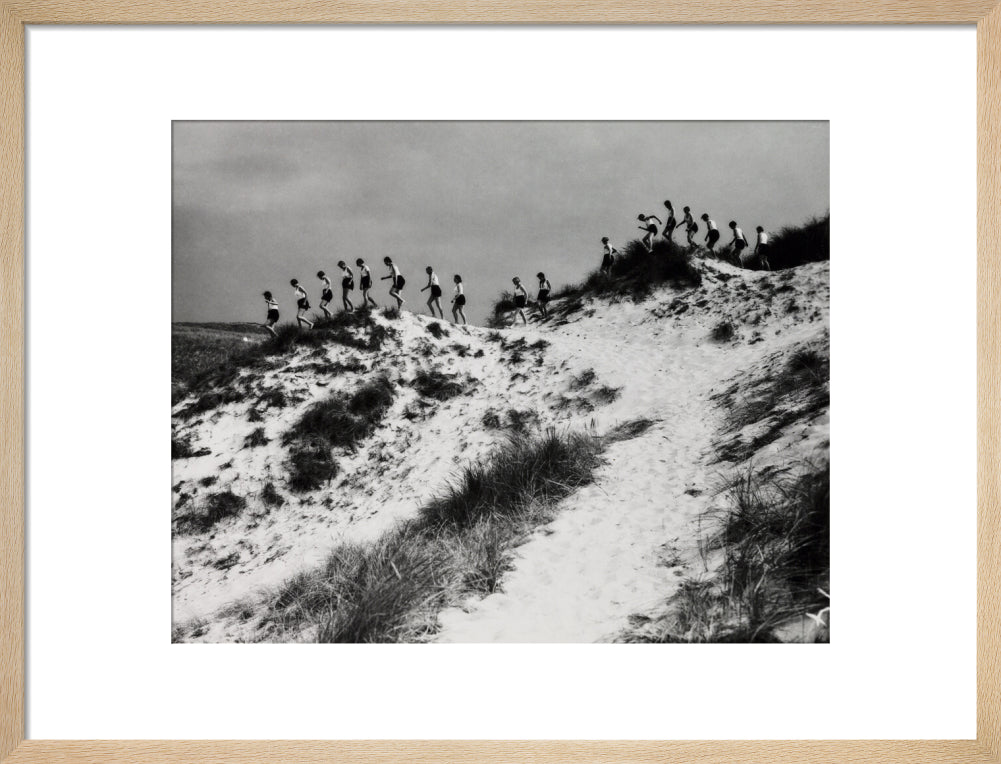 Horizon line of women walking over dunes, about 1930. art print medium natural Art Print - Science Museum Shop