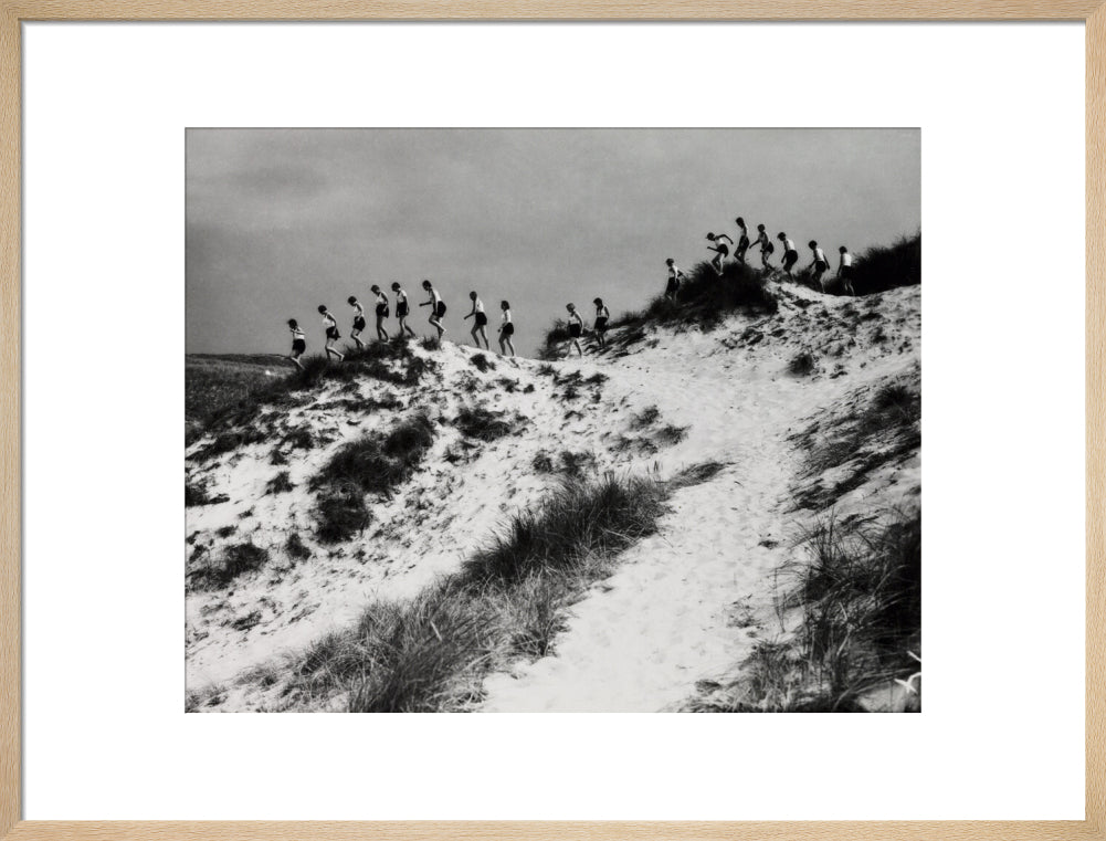 Horizon line of women walking over dunes, about 1930. art print large natural Art Print - Science Museum Shop