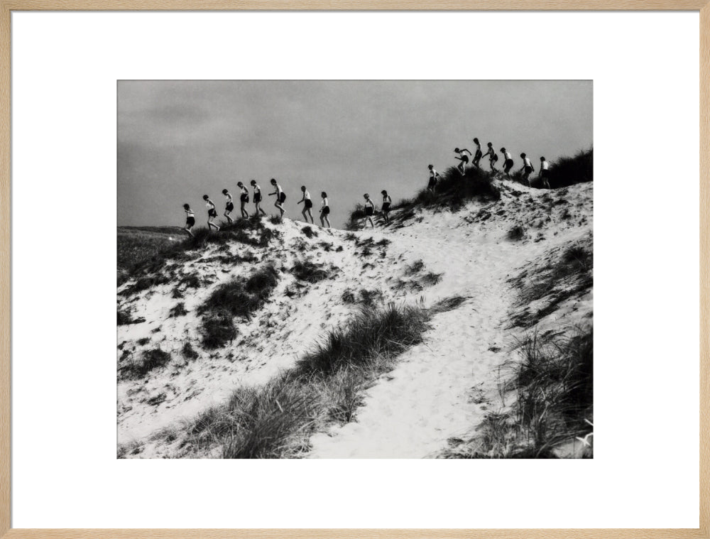 Horizon line of women walking over dunes, about 1930. art print extra large natural Art Print - Science Museum Shop