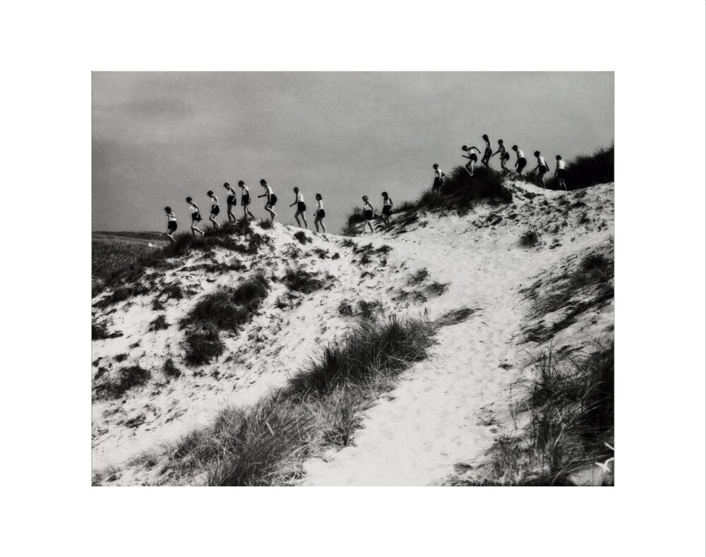 Horizon line of women walking over dunes, about 1930. art print extra small none Art Print - Science Museum Shop
